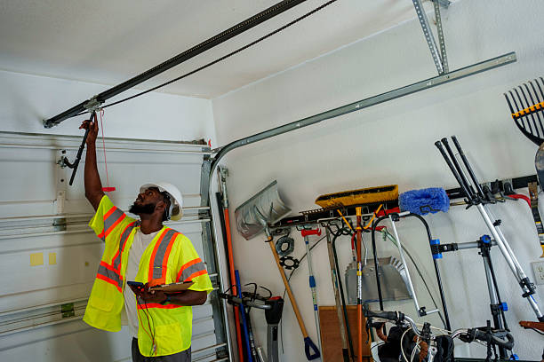 Professional Garage Door Panel Replacement technician working in Las Quintas Fronterizas, TX